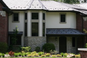 Hardcoat acrylic stucco with window trim at bump out.