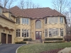 Hard coat stucco with custom trim and stone in Somerset County
