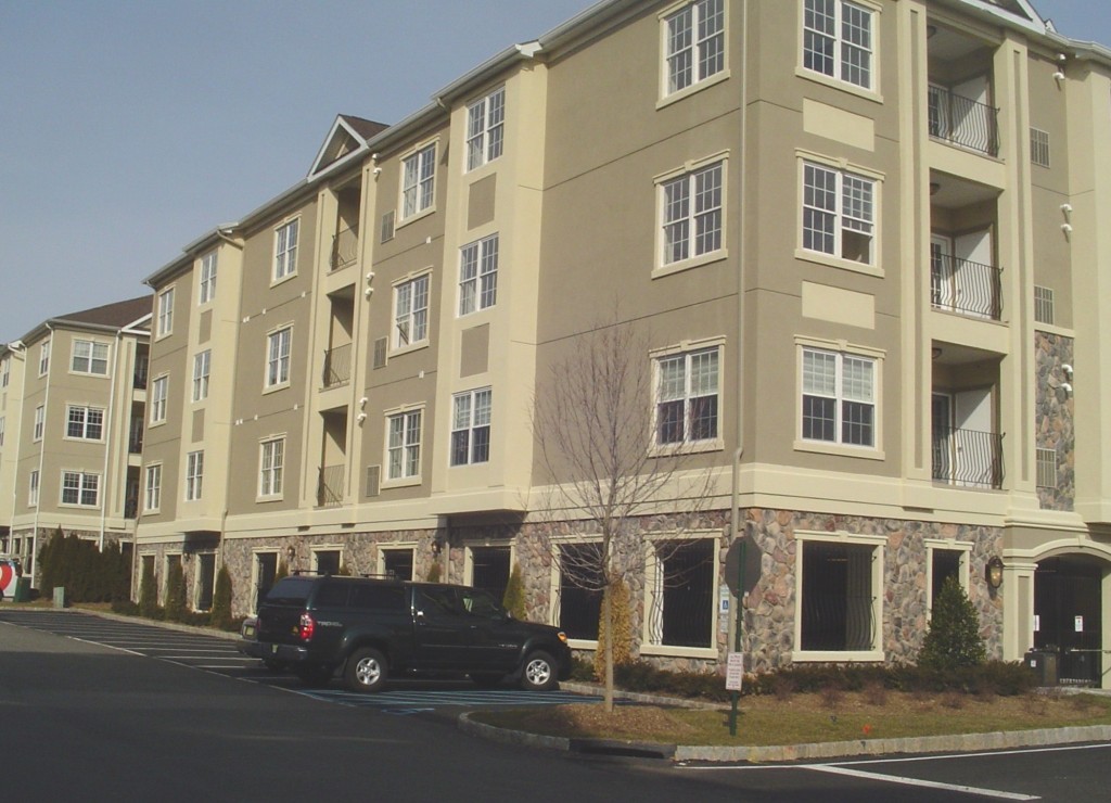 Stucco Apartment Building Renovation Process Reference: Acrylic Stucco